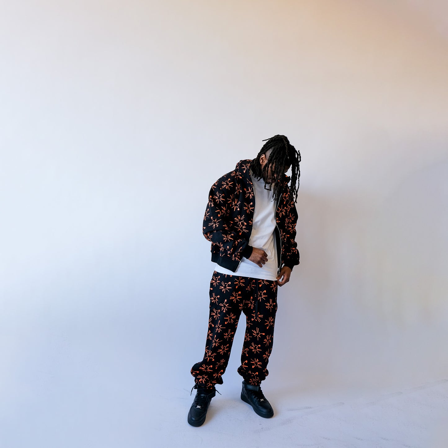 *ARCHIVE* CLOCKWORK CUFFED SWEATPANTS (BLACK/ORANGE)